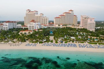 Aerial view of a luxury beachfront resort at dusk