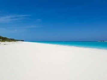 White sand beach and clear turquoise water on Exuma